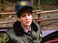 Julie Downing as Officer Walker